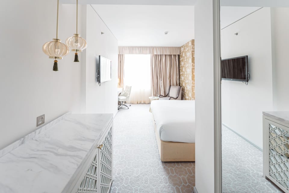 Executive Room | Premium bedding, minibar, in-room safe, desk