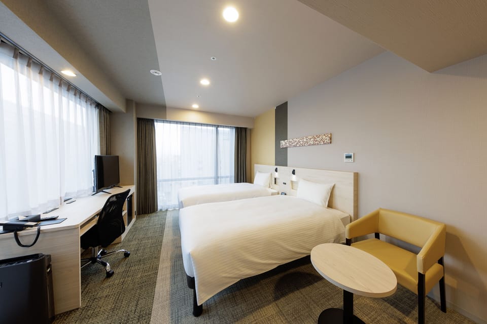 Desk, laptop workspace, free WiFi, bed sheets