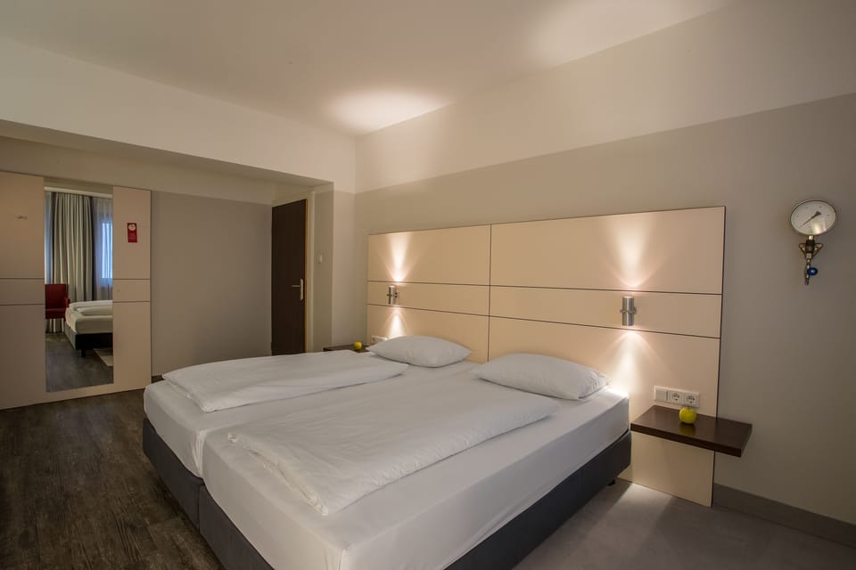 Comfort Double Room | In-room safe, desk, soundproofing, free WiFi