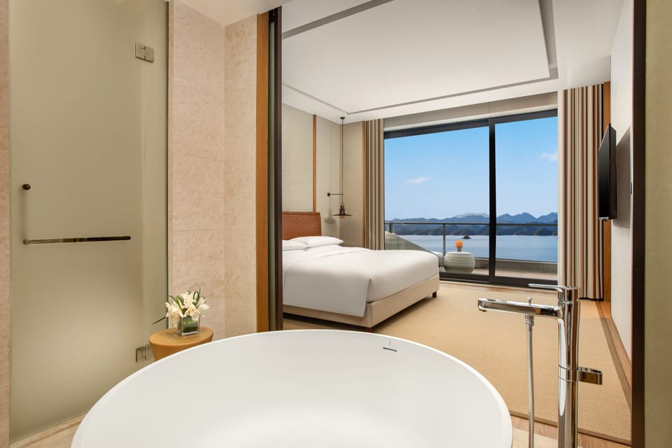 Premium bedding, down comforters, pillowtop beds, minibar