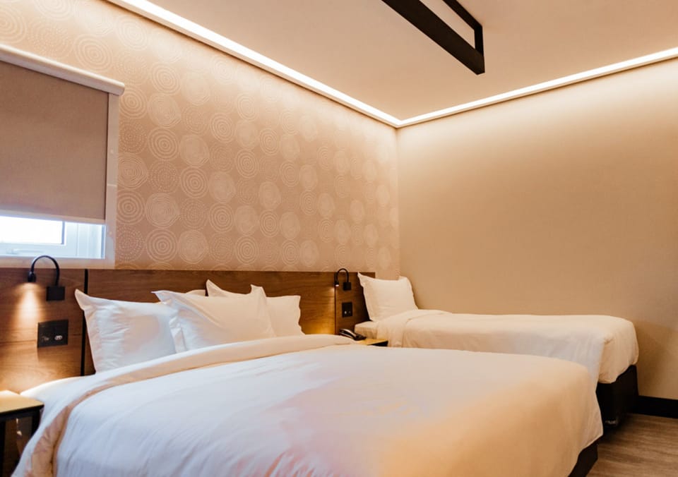 Standard PwD Disability Access Triple - 1 King Bed and 1 Single Bed | Minibar, free WiFi, bed sheets