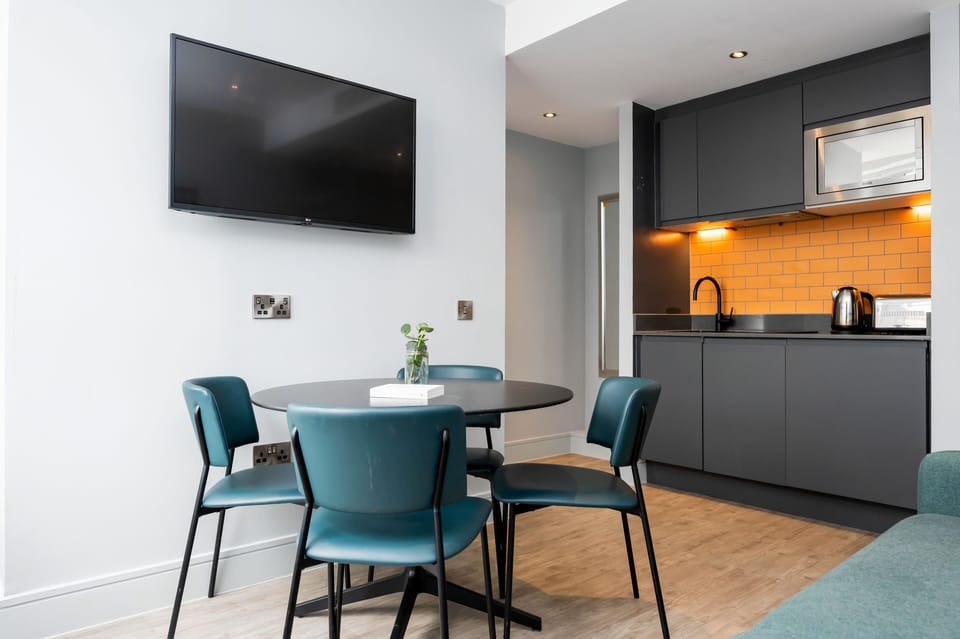 Apartment, 1 Bedroom | Laptop workspace, blackout drapes, soundproofing, iron/ironing board
