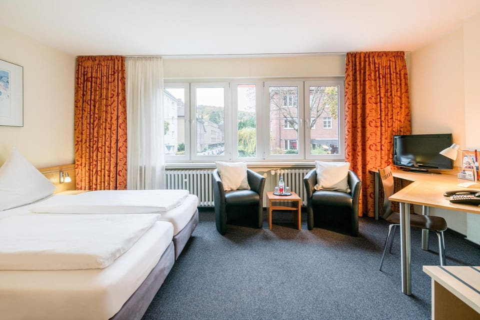 Triple Room | In-room safe, desk, iron/ironing board, free cribs/infant beds