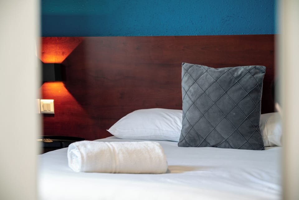 Desk, blackout drapes, soundproofing, free cribs/infant beds