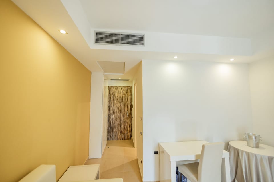 Junior Suite, Balcony | Living area | LCD TV