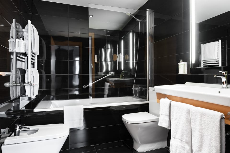 Premium bedding, memory foam beds, minibar, in-room safe
