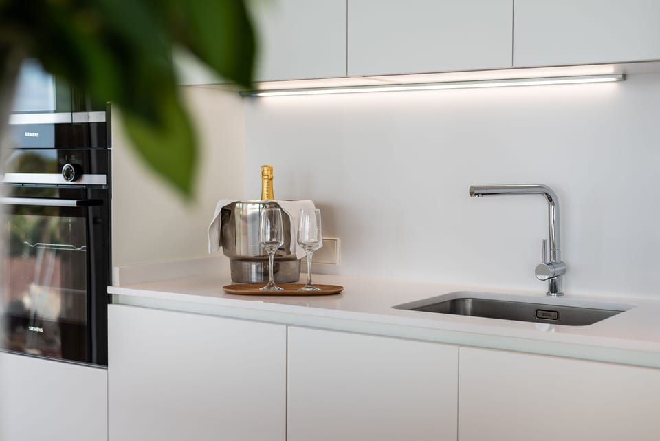 Espresso maker, coffee/tea maker, microwave, oven