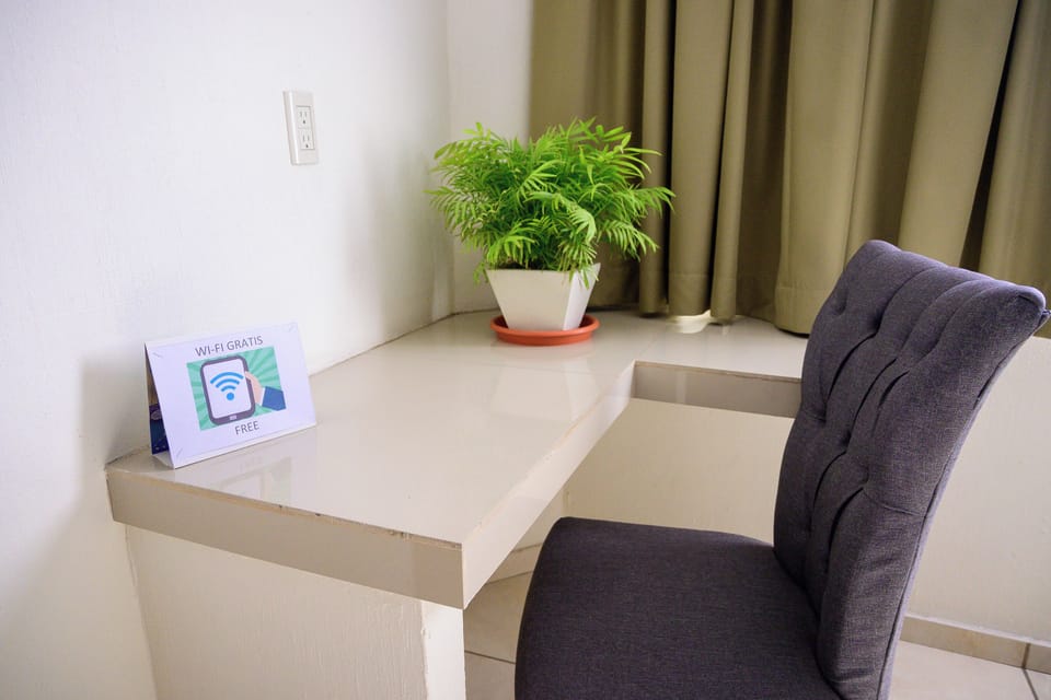 Comfort Double Room, 2 Double Beds | Living area | Flat-screen TV