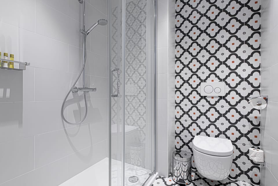 Shower, eco-friendly toiletries, hair dryer, towels