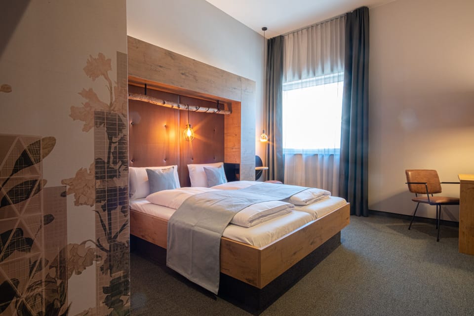 Hypo-allergenic bedding, desk, blackout drapes, soundproofing