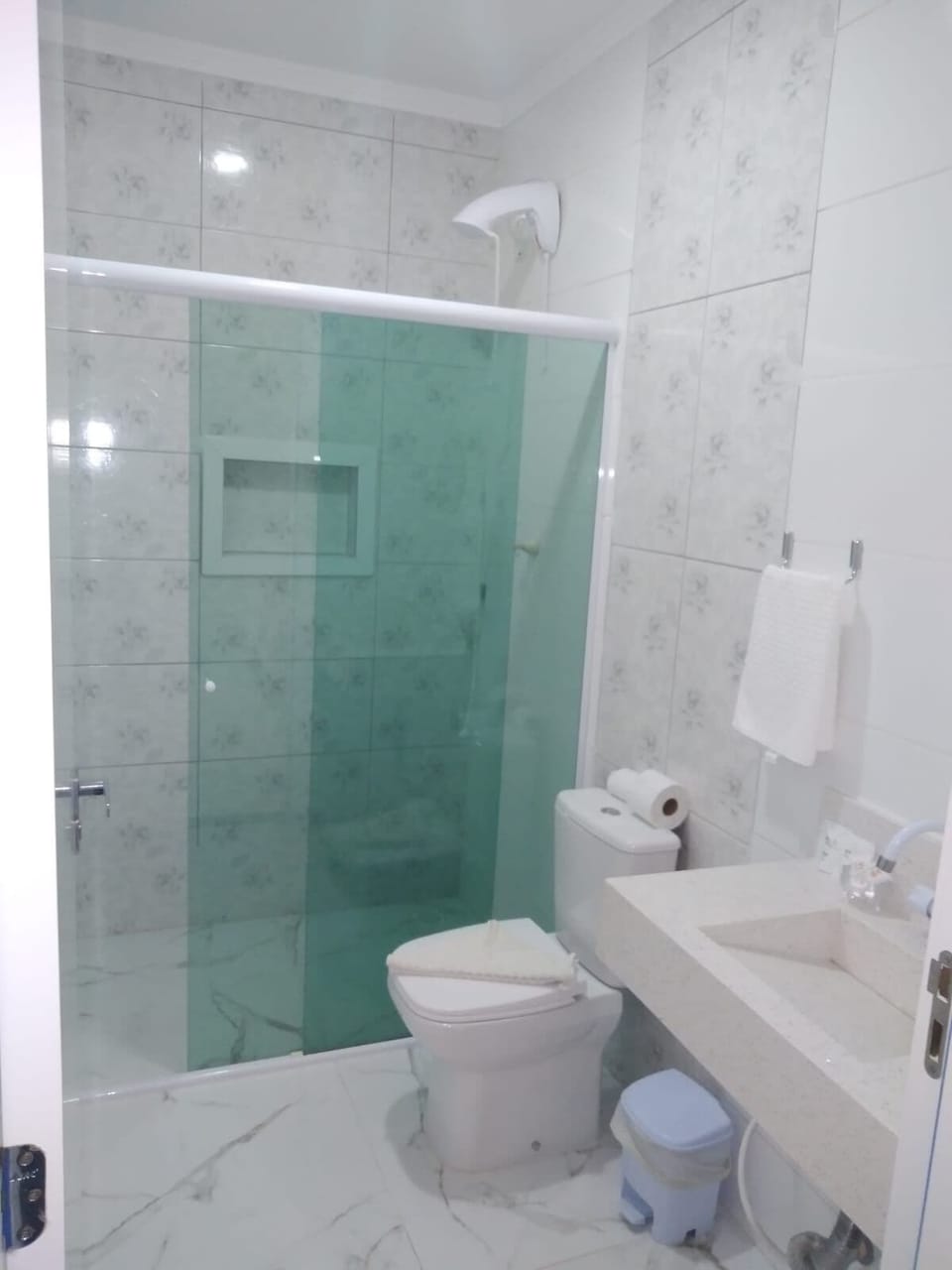 Shower, towels, soap, shampoo