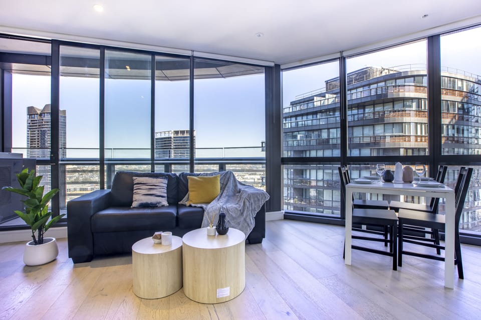 City Apartment, 1 Bedroom, Balcony, City View | Living area | Flat-screen TV