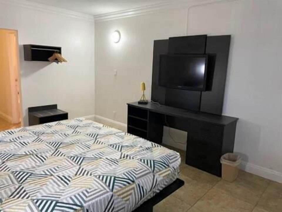 Premium bedding, desk, laptop workspace, WiFi (free)