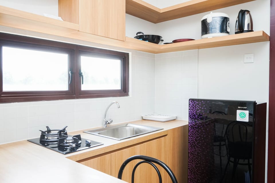 Room | Private kitchen | Fridge, stovetop, electric kettle, cookware/dishes/utensils