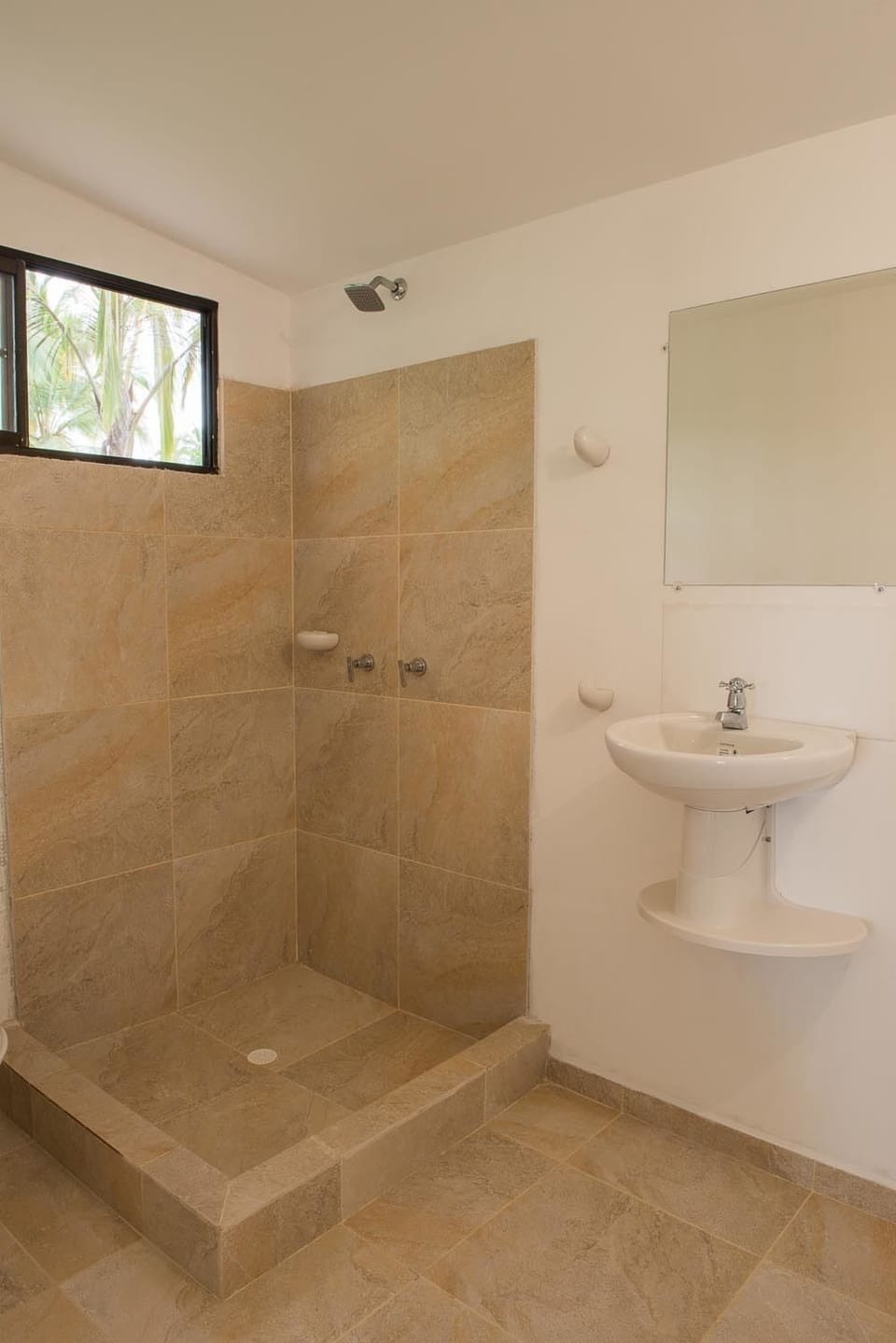 Shower, towels, soap, toilet paper