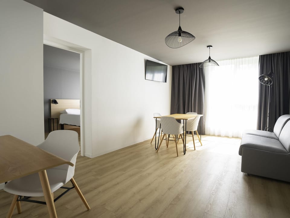 Family Suite, 1 Double Bed with Sofa bed | In-room safe, desk, blackout drapes, soundproofing