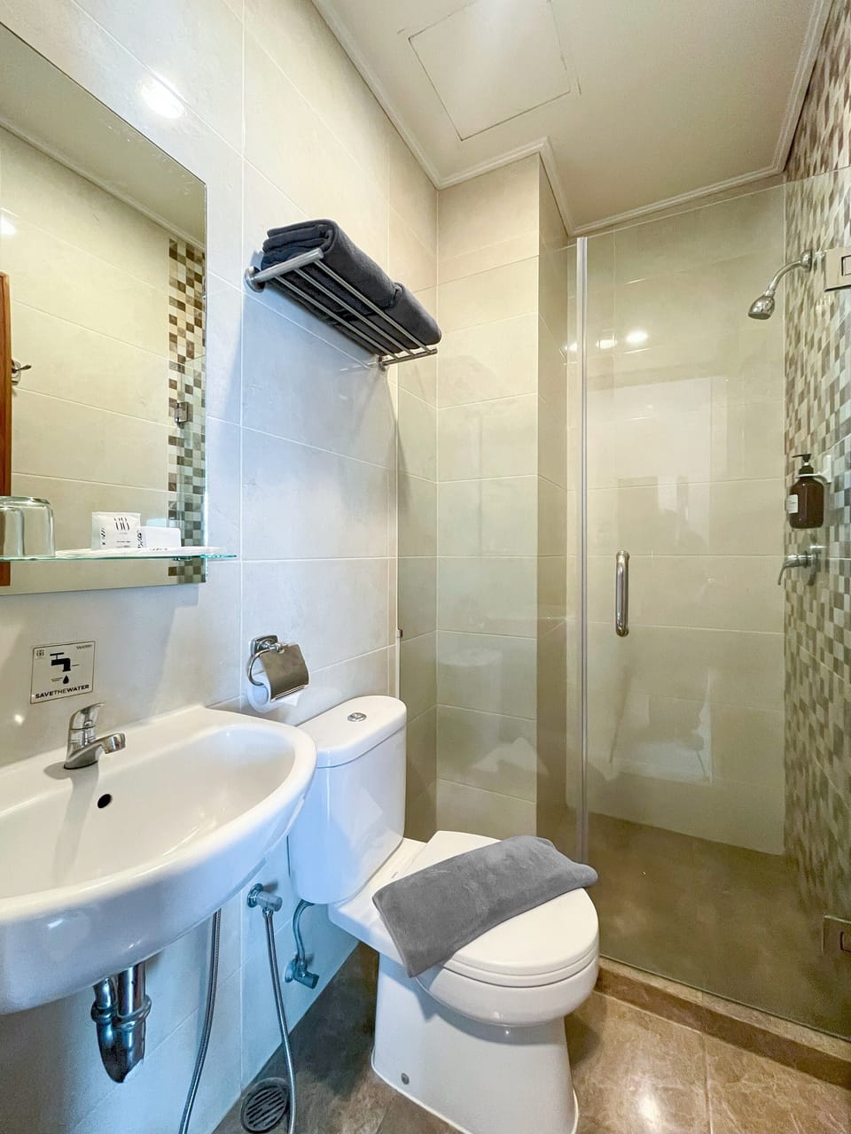 Shower, free toiletries, slippers, towels