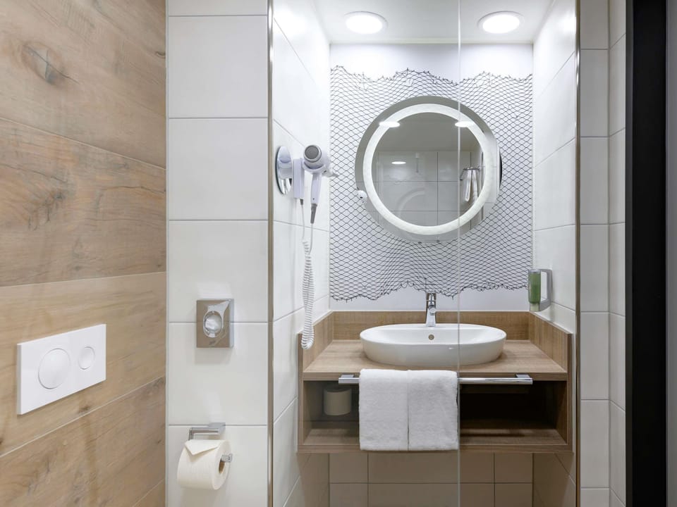 Shower, eco-friendly toiletries, towels, soap