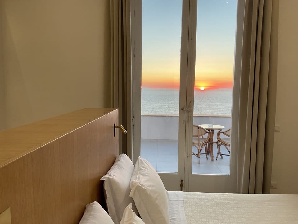 Deluxe Double Room, Balcony | In-room safe, desk, laptop workspace, bed sheets