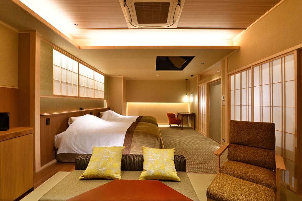 Spacious Japanese style room with open-air bath, Non Smoking | Down comforters, in-room safe, WiFi (free), bed sheets
