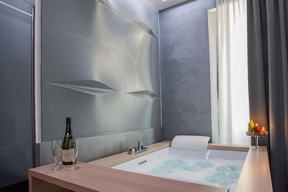 Suite, Jetted Tub | Bathroom | Designer toiletries, hair dryer, slippers, bidet