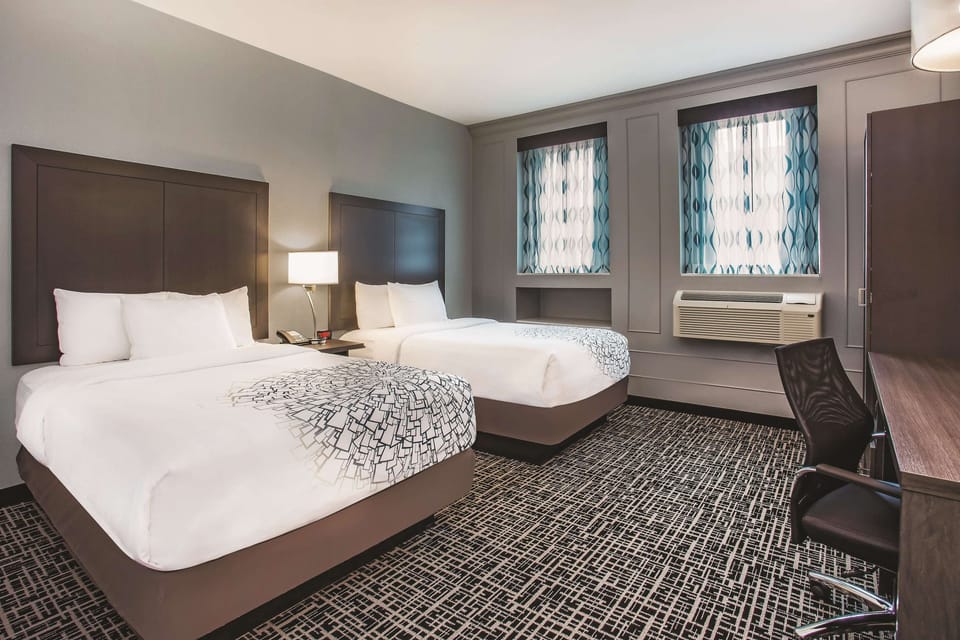 Deluxe Room, 2 Double Beds, Non Smoking | Pillowtop beds, desk, laptop workspace, blackout drapes