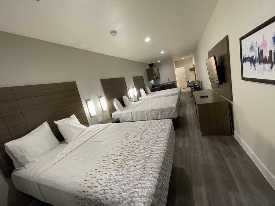 Family Room | Desk, blackout drapes, iron/ironing board, free WiFi