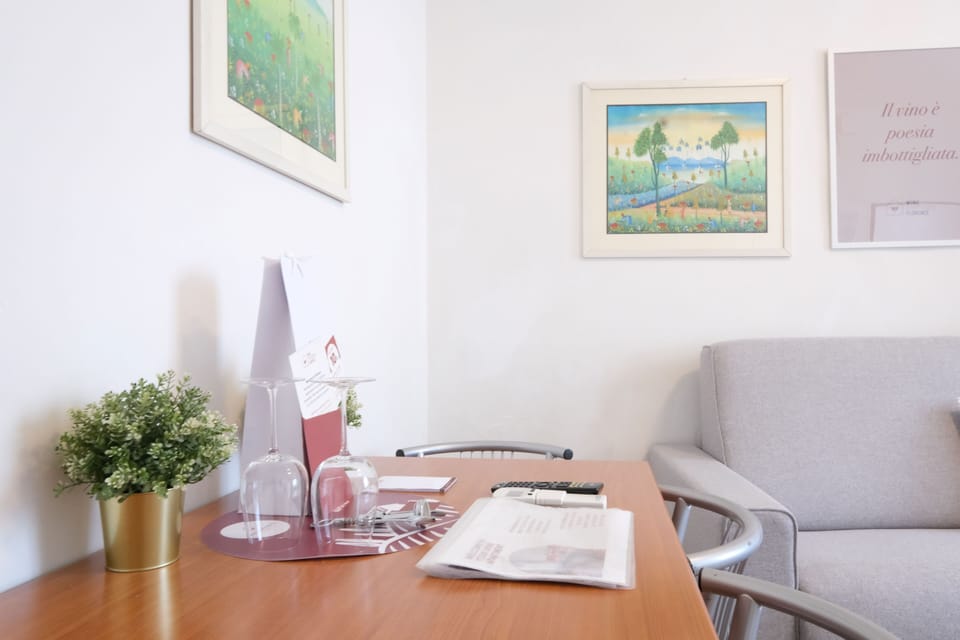 Standard Apartment, 1 Bedroom | Living area | 40-inch flat-screen TV with satellite channels, TV