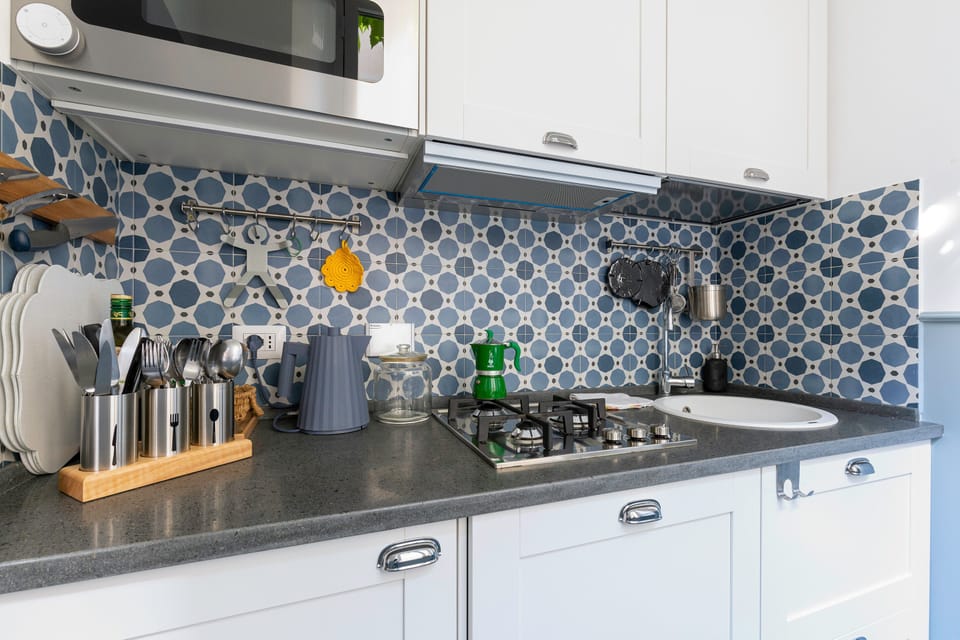 Design Apartment | Private kitchen | Fridge, stovetop, cookware/dishes/utensils, freezer