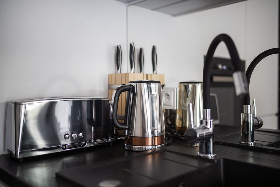 Design Apartment | Private kitchen | Full-size fridge, oven, stovetop, dishwasher