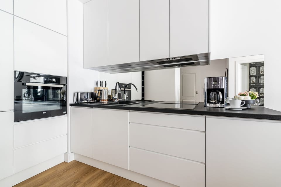 Design Apartment | Private kitchen | Full-size fridge, oven, stovetop, dishwasher