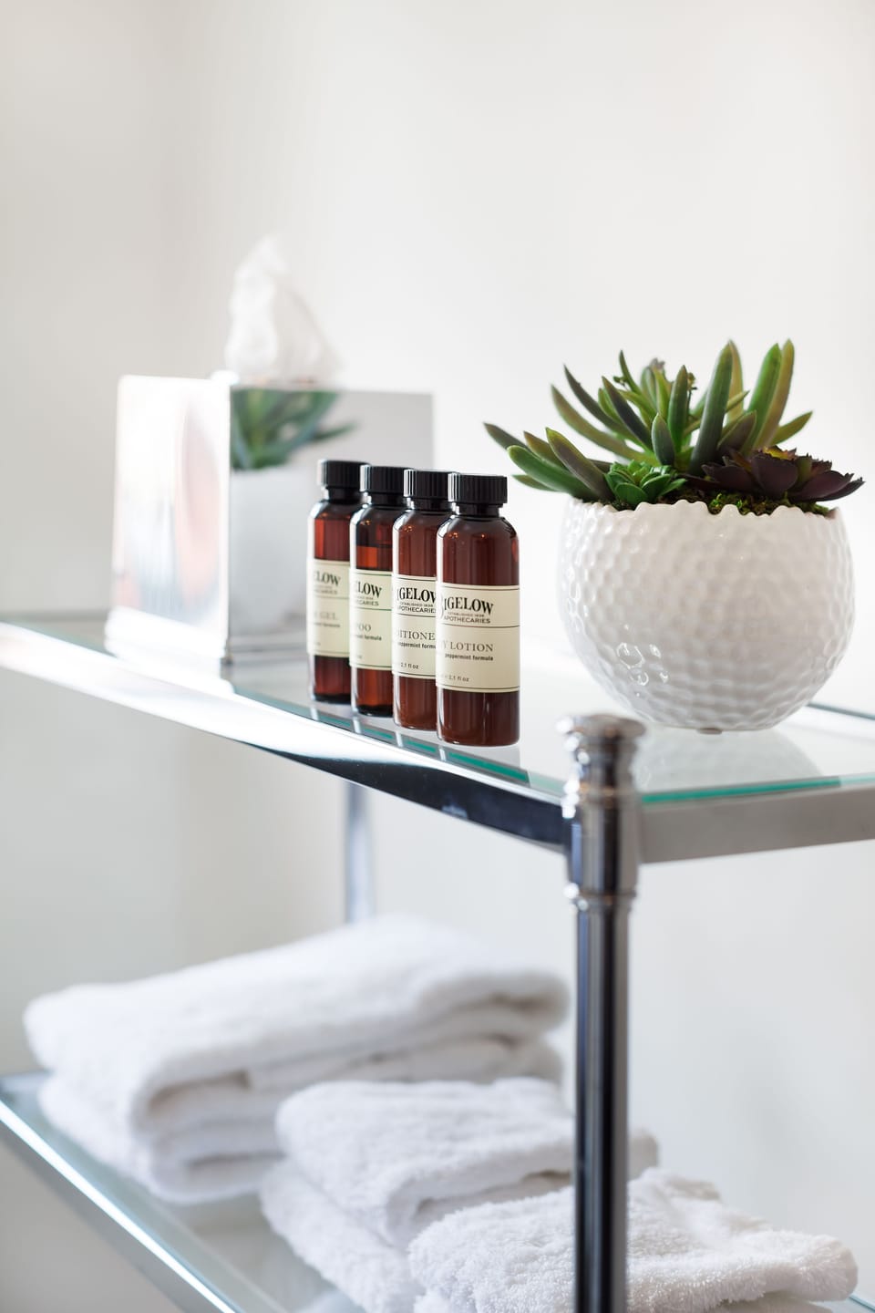 Combined shower/tub, designer toiletries, hair dryer, bathrobes