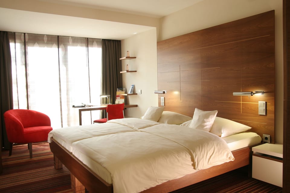 Desk, blackout drapes, soundproofing, free WiFi