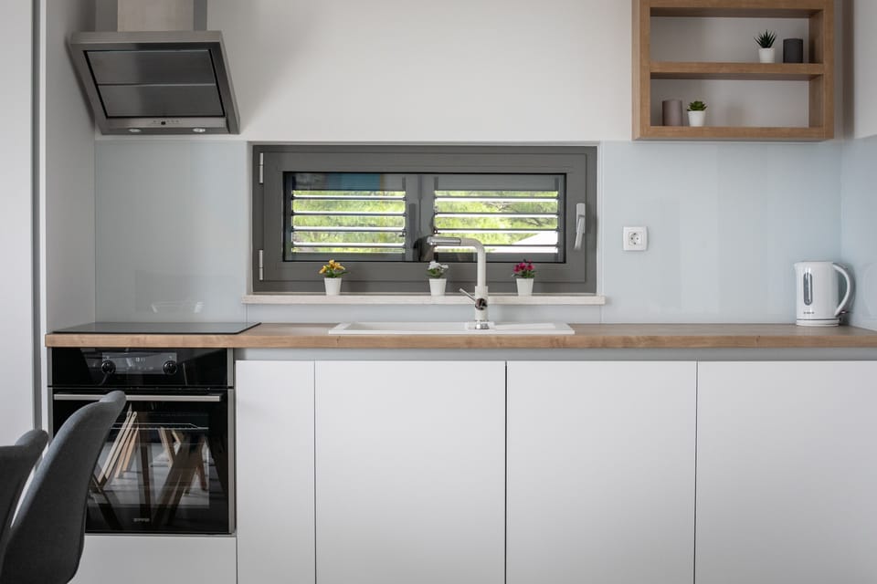 Full-size fridge, espresso maker, paper towels