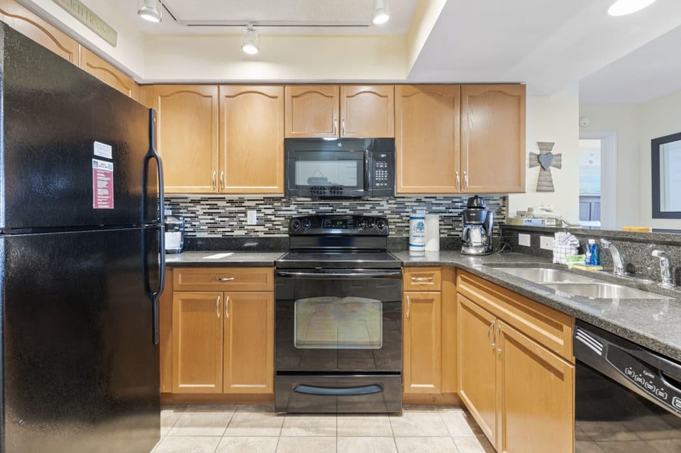 Signature Condo, 2 Bedrooms, 2 Bathrooms, Ocean View | Private kitchen | Fridge, microwave, oven, stovetop