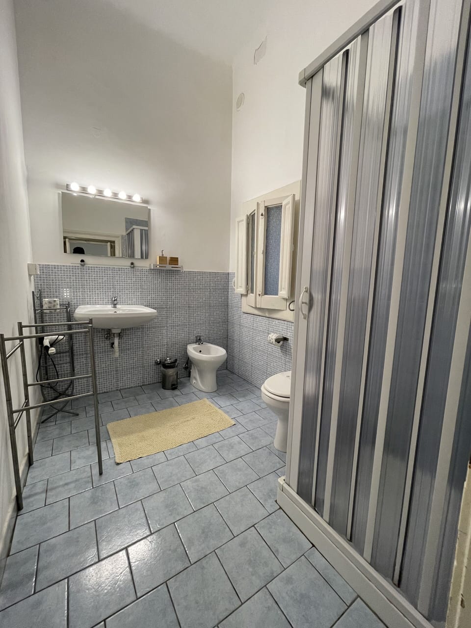 Standard Townhome | Bathroom | Shower, rainfall showerhead, hair dryer, bidet