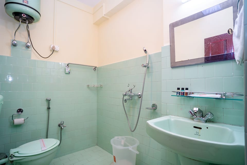 Shower, free toiletries, slippers, towels