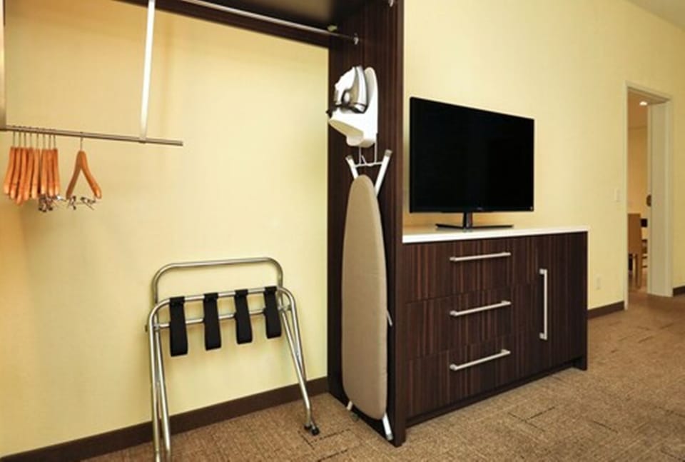 Suite, 1 Queen Bed | Hypo-allergenic bedding, blackout drapes, iron/ironing board, free WiFi