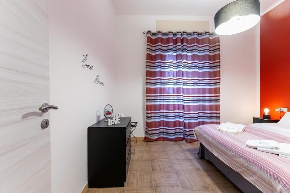 Deluxe Apartment, 1 Bedroom | 1 bedroom, blackout drapes, soundproofing, iron/ironing board
