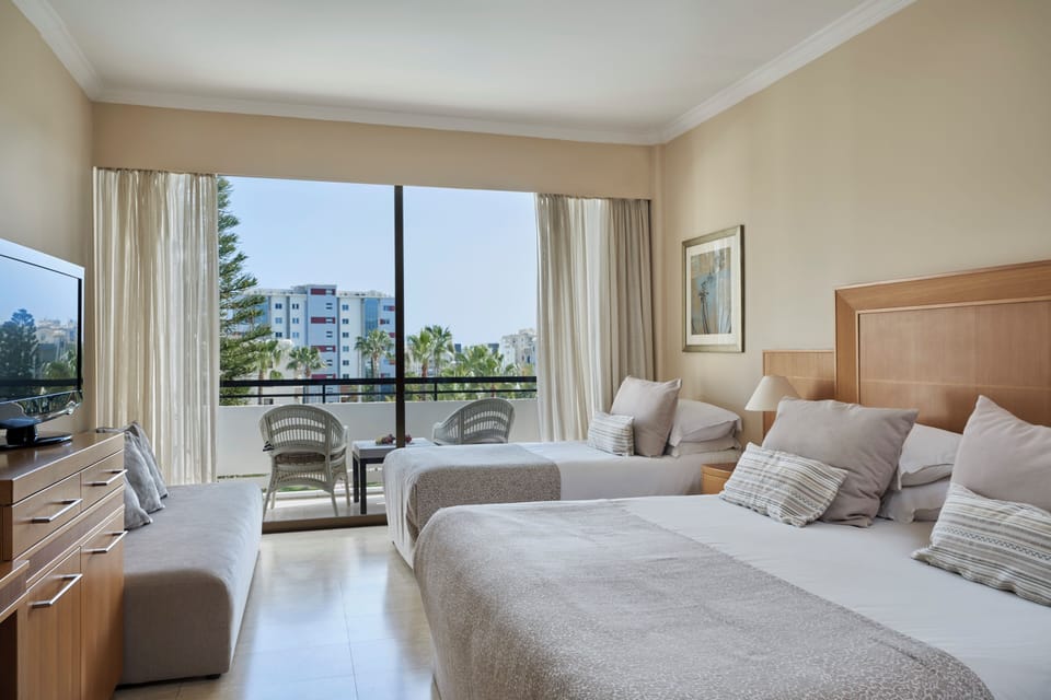 Family Room Pool View | In-room safe, blackout drapes, soundproofing, iron/ironing board