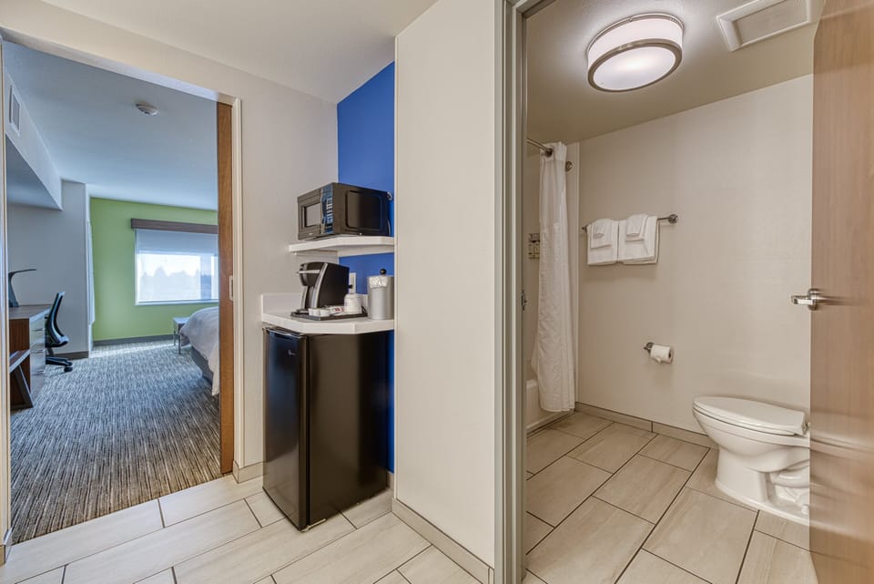 Suite, 1 Bedroom | 1 bedroom, in-room safe, desk, iron/ironing board