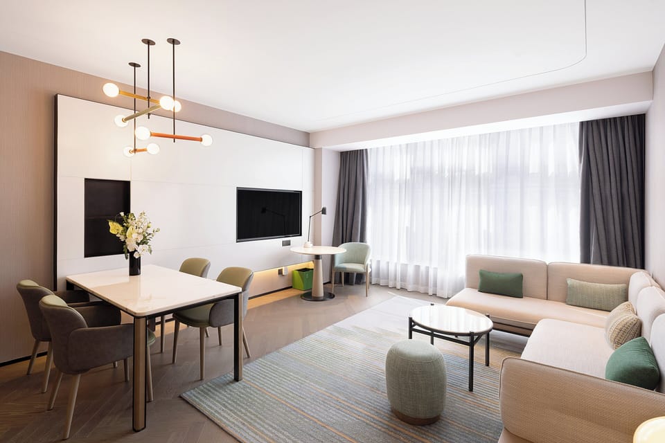 Suite, 1 Bedroom (Dining Areas) | Premium bedding, minibar, in-room safe, desk