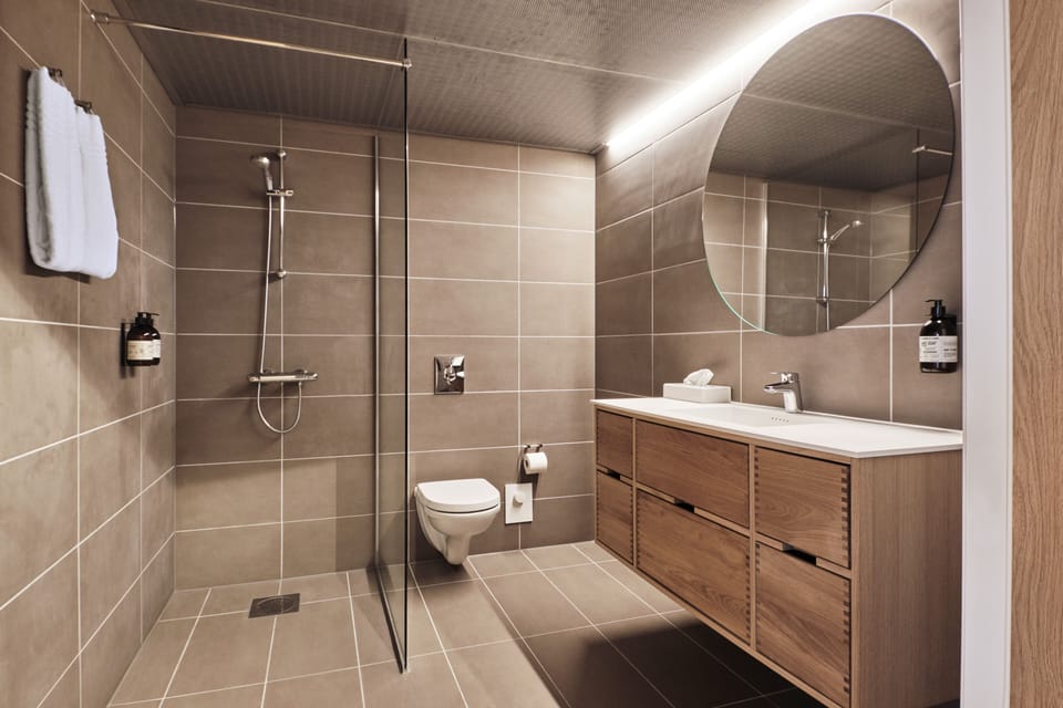 Shower, rainfall showerhead, eco-friendly toiletries, hair dryer