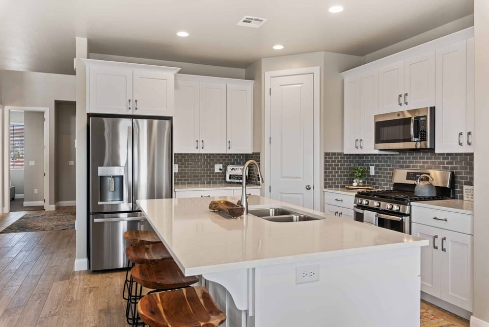 Townhome, 4 Bedrooms | Private kitchen | Coffee/tea maker, fridge, oven, toaster