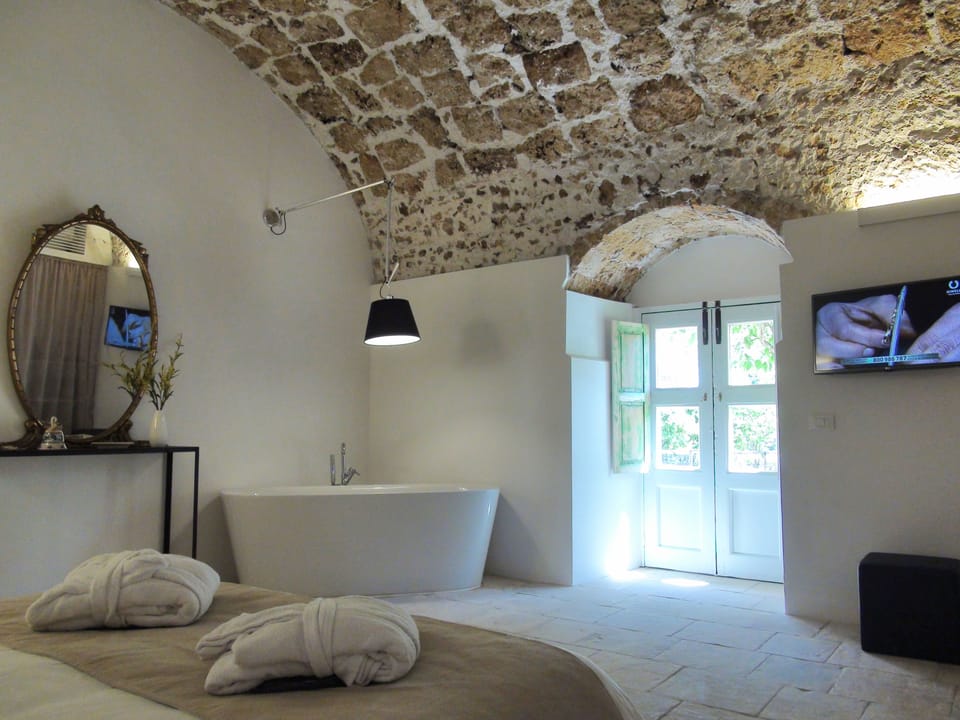 Elite Room, 1 Queen Bed, Bathtub, Garden Area | View from room