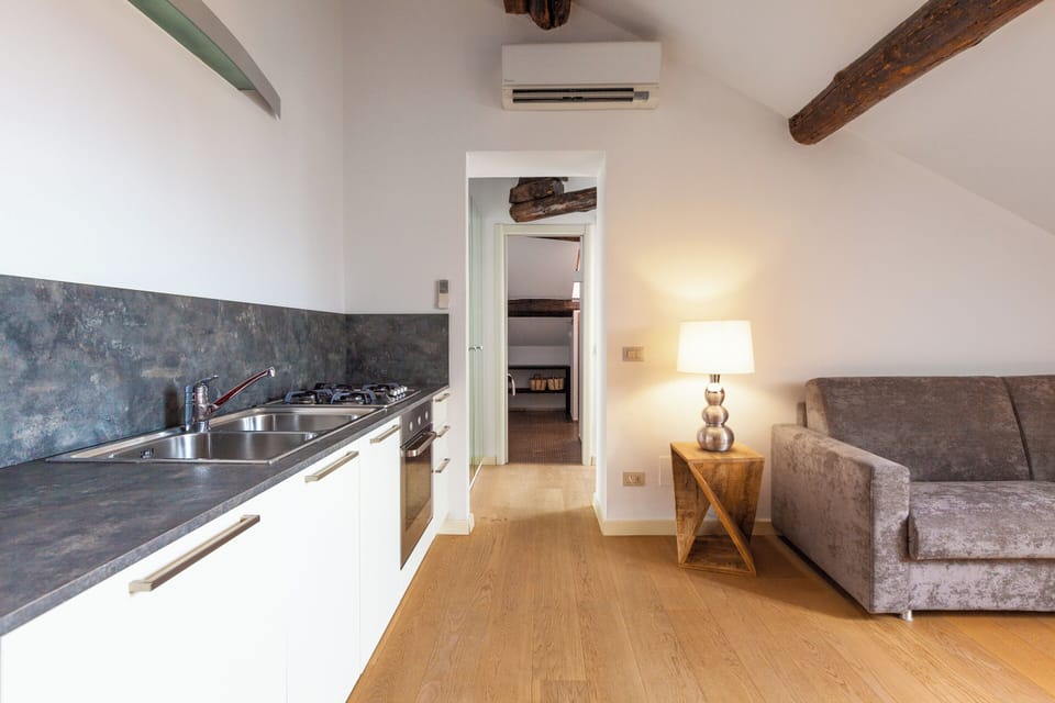 Apartment, 1 Bedroom | Living room | Flat-screen TV
