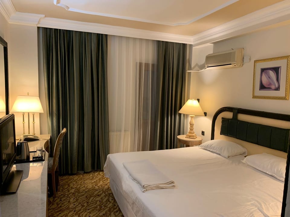 Minibar, desk, laptop workspace, blackout drapes