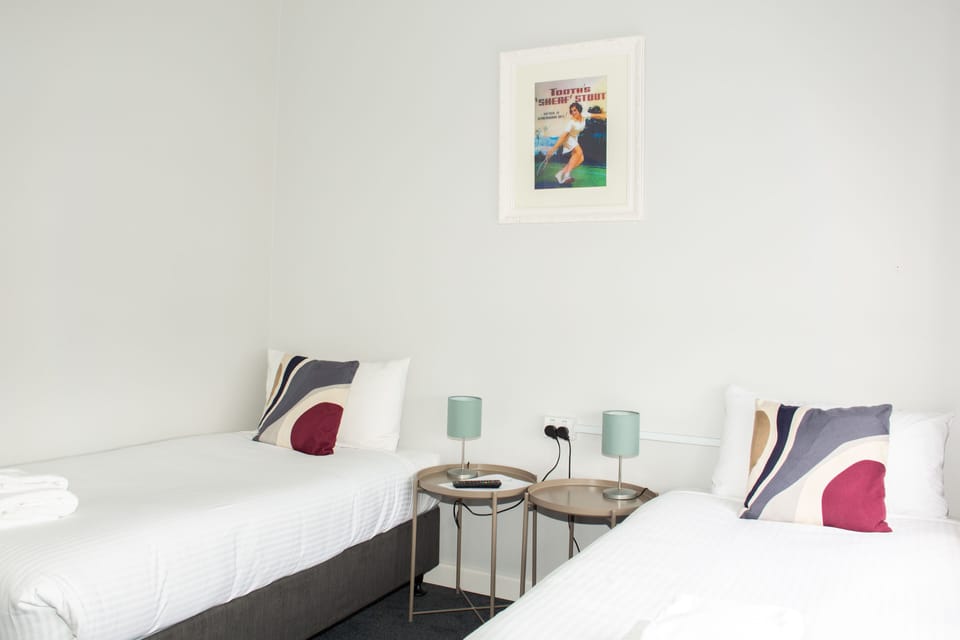 Twin Room with Shared Bathroom | Desk, WiFi, bed sheets