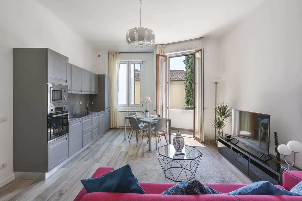 Basic Apartment, Multiple Beds | Living room | TV