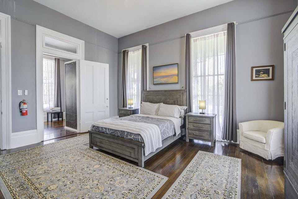 The Grey Suite | Premium bedding, in-room safe, desk, blackout drapes